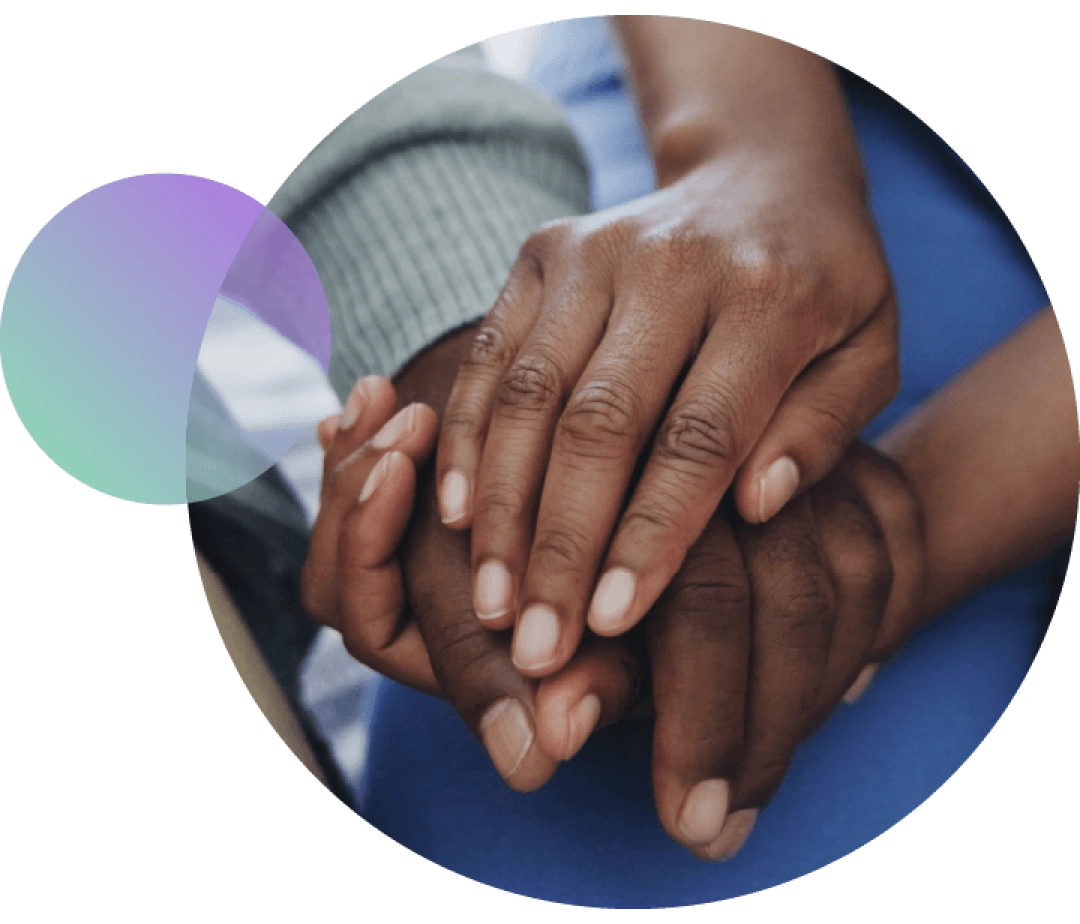 Branding elements; close-up of hypothetical CareASSIST® patients holding hands